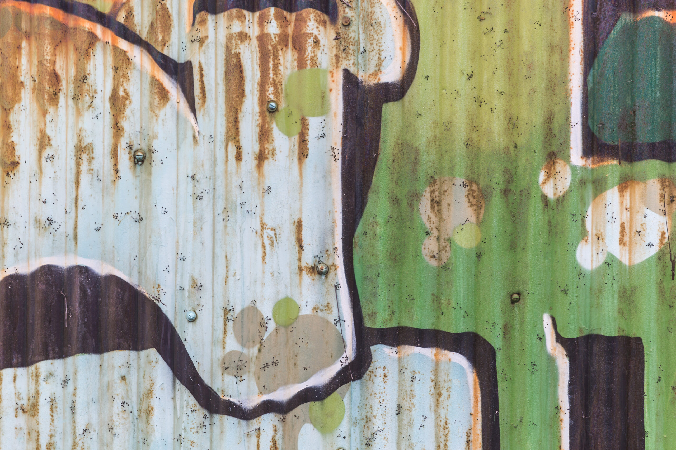 rusty-green-tin-graphitti-wall-texture